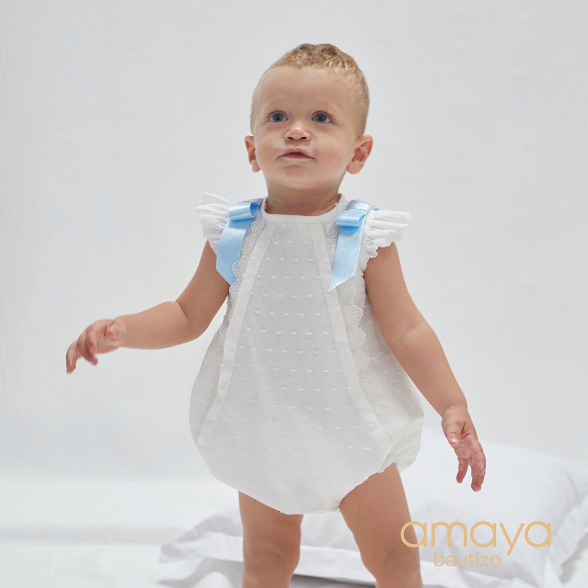 582031 BABY ROMPER IN PLUMETI